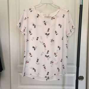 White Top with blue and orange flowers